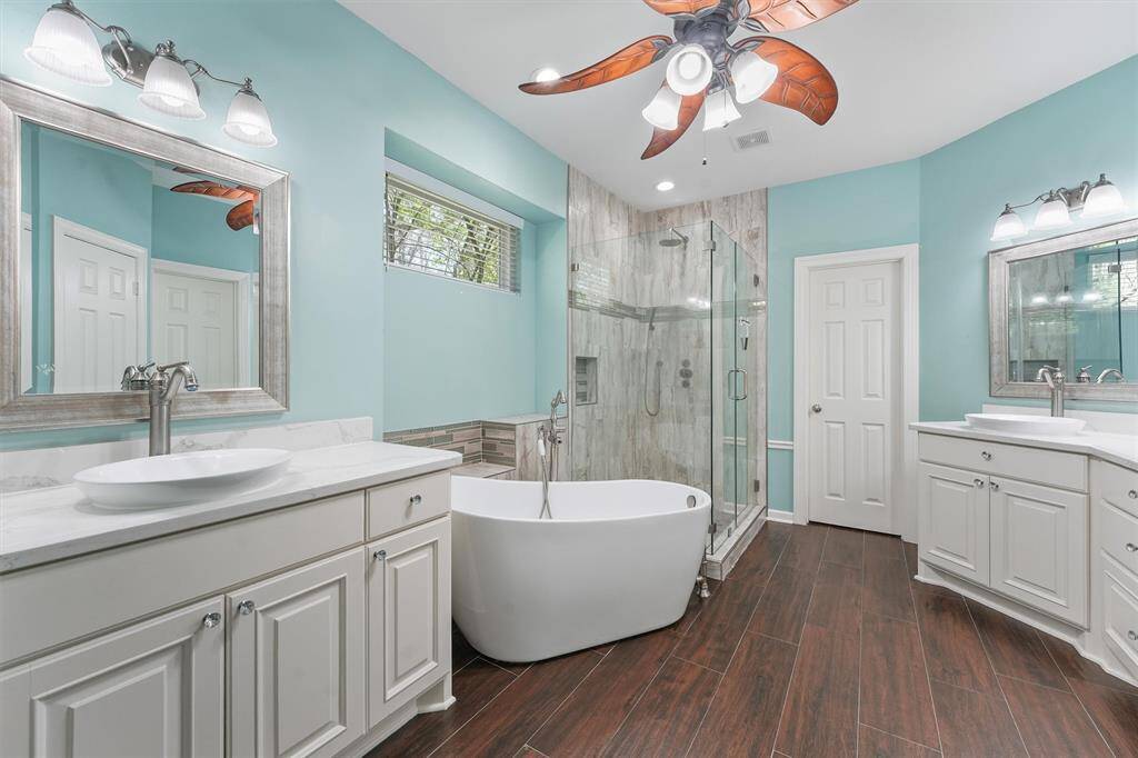 Master bathroom, separate shower, two separate cabinets and his and her closets.