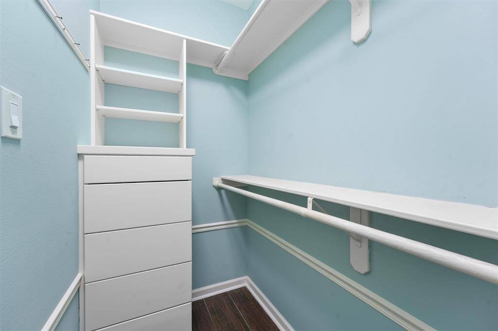 This is the second primary closet with built-in drawers.