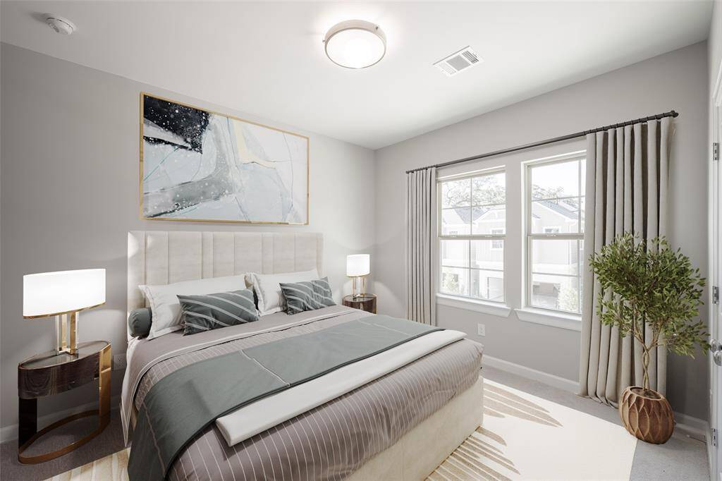 Secondary bedroom is spacoius even for a king bed. (vrtually staged)