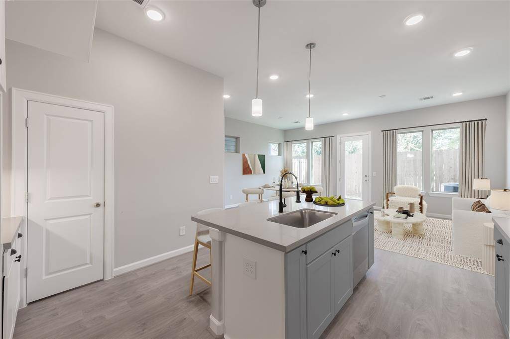 Kitchen also has a dedcated walk-in panry. (virtually staged)