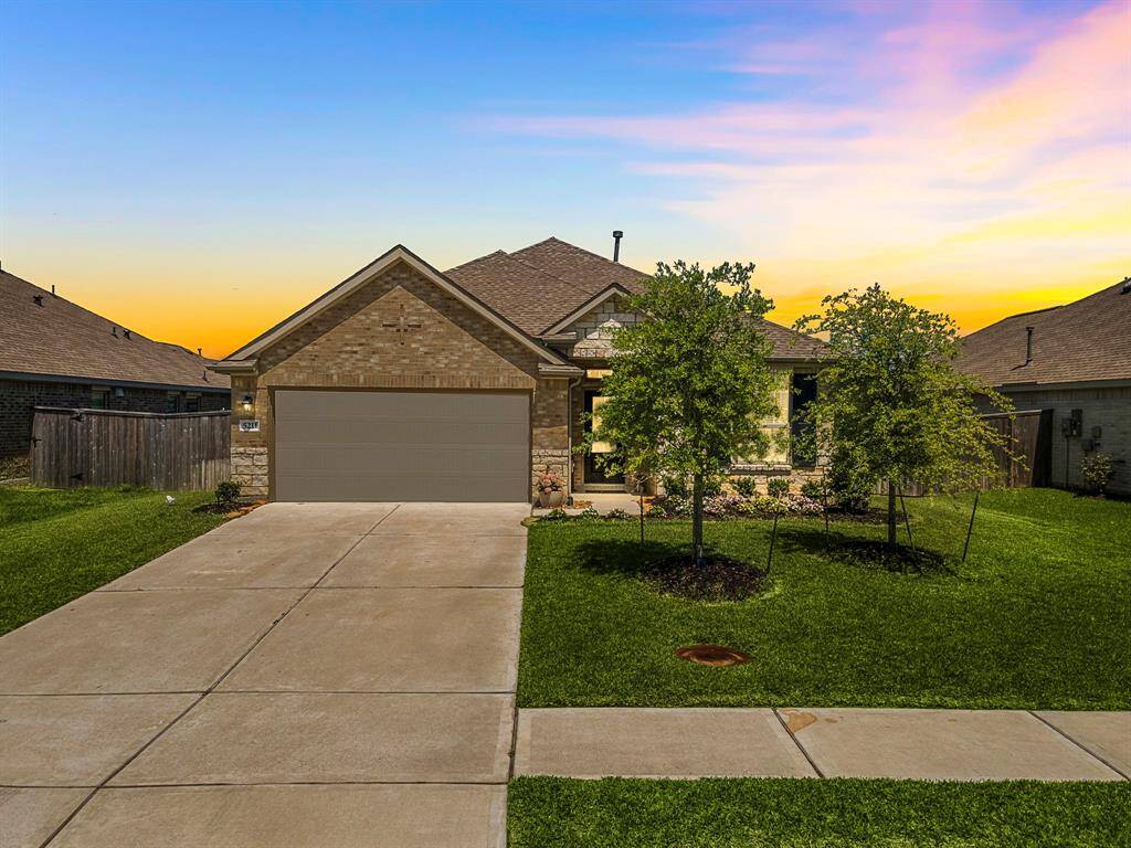 Enjoy beautiful curb appeal with well-maintained front landscaping that welcomes you home.