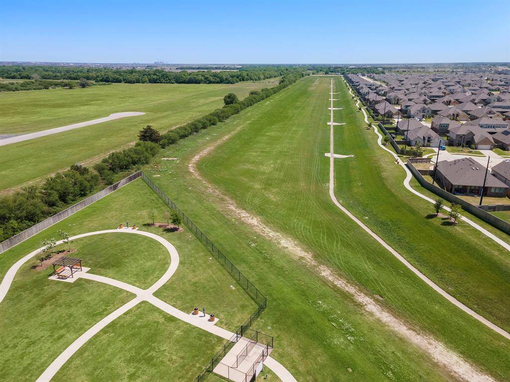 The neighborhood offers parks, a gazebo, picnic areas, and walking paths, providing ample outdoor recreation opportunities. Ideal for families seeking a community with access to nature.