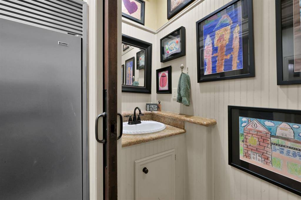 The laundry room also has a 1/2 bath!