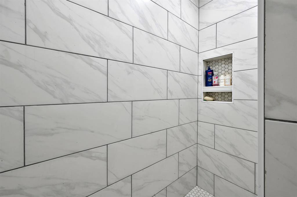 The primary bathroom walk-in shower