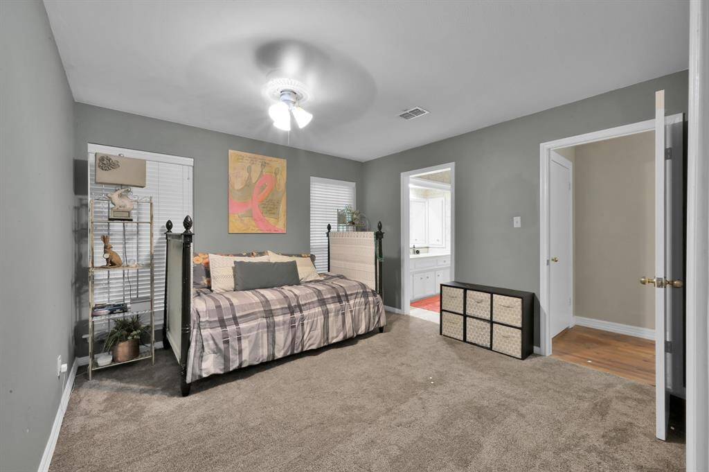 Bedroom 5 has a private ensuite bathroom, walk-in closet, and Juliet window overlooking the back stairs.