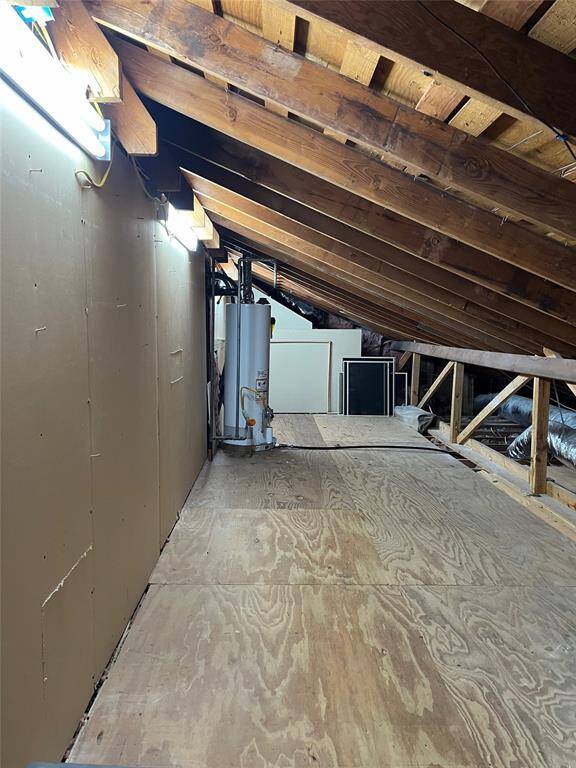 With a walk-in door in the upstairs hall, the Texas basement above the main living area may not be pretty but it is amazing!  Imagine storing all you holiday decorations and precious memorabilia inside your home.  No more trips to the storage unit and no more storage fees. And a Dad "bonus":  Both water heaters are in this space so no more trips on the shaky attic ladder to access the water heaters.