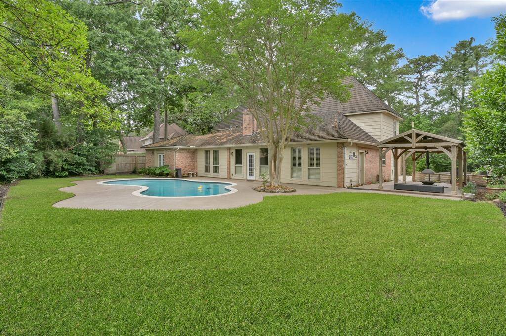 The backyard: secluded and literally perfect!  The pool was renovated resurfaced in 2020.