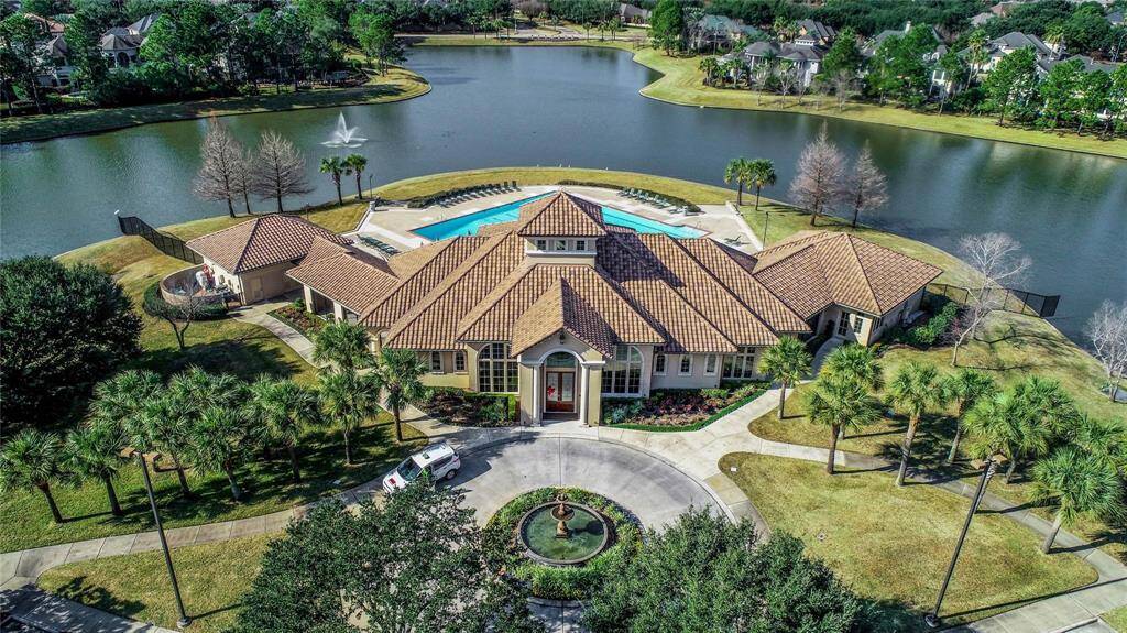 The community also features a clubhouse, sand volleyball court, tennis and pickleball courts, and two playgrounds, along with a community book-share and scenic lakes and trails for outdoor recreation. Additionally, it provides convenient access to Kirk Elementary and bus services for the Village, British, and Awty International Schools, making it an ideal choice for families seeking both luxury and convenience.