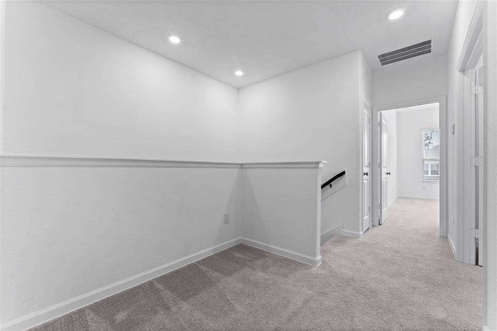 This flexible loft area is ready to adapt to your needs—whether it’s a home office, study nook, or gaming setup. It offers plush carpeting, recessed lighting, and a convenient hallway storage closet perfect for games, supplies, or tech accessories. The possibilities are endless for this bonus space.