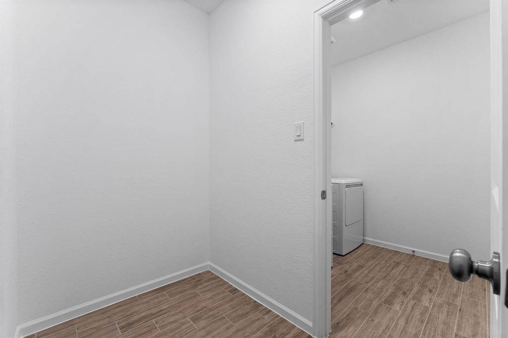 Large 7' x 5' room off the laundry area for storage.