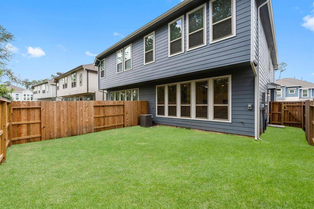 Your home includes front and back irrigation system to keep your yard looking lush and green. There is also front and rear gutters for rainwater management. New sod in 2022.