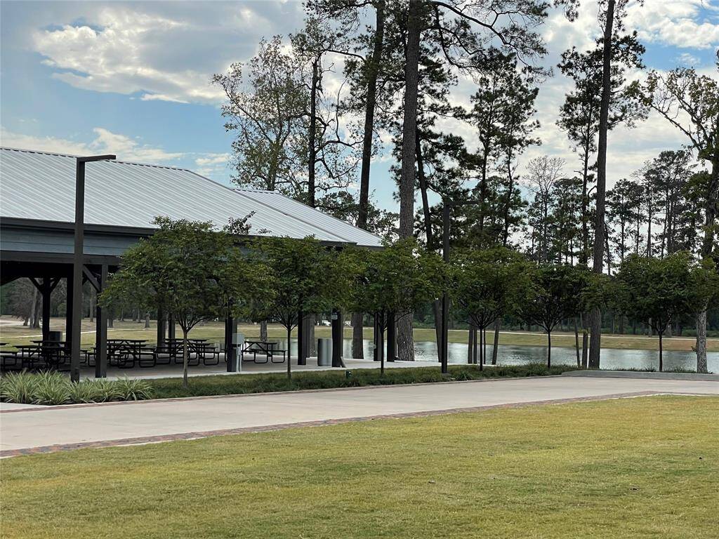 Shaded pavilion and picnic area near the large lake