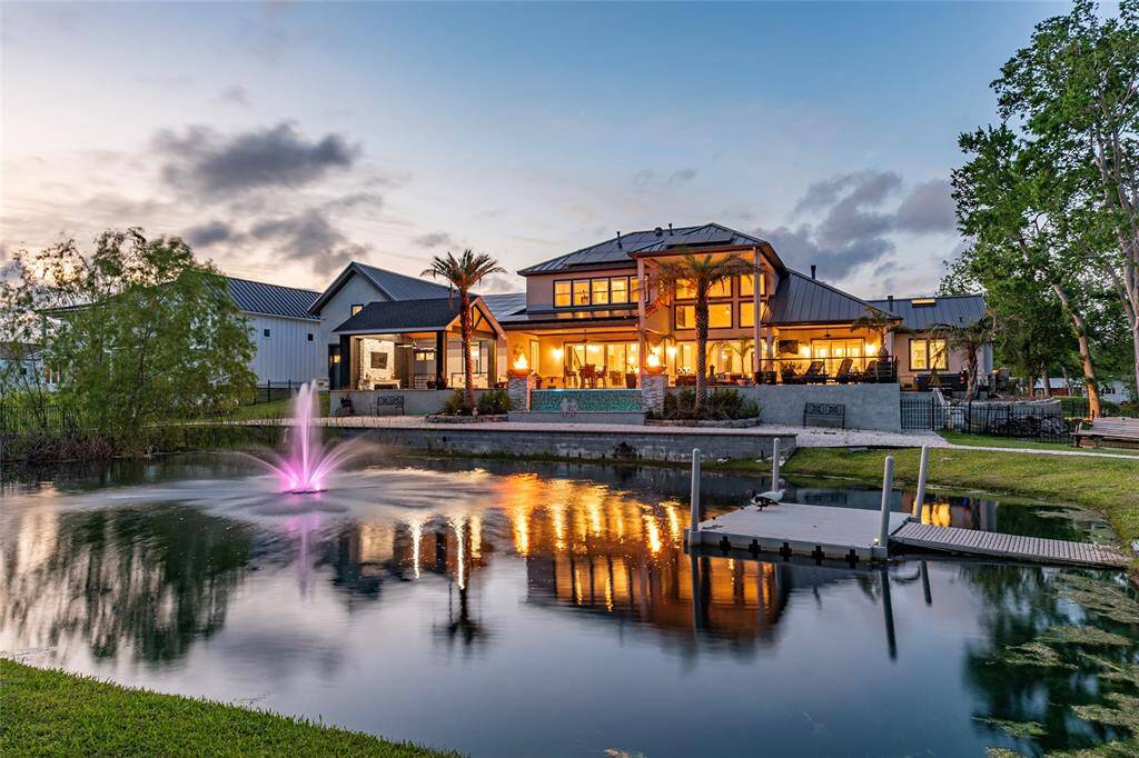 Luxury Designer Home Offering Expansive Living and Timeless Sophistication. Situated on a private 1.1 acre lot nestled on a quiet cul-de-sac in the Galveston County area of Dickinson TX, outside the city limits.