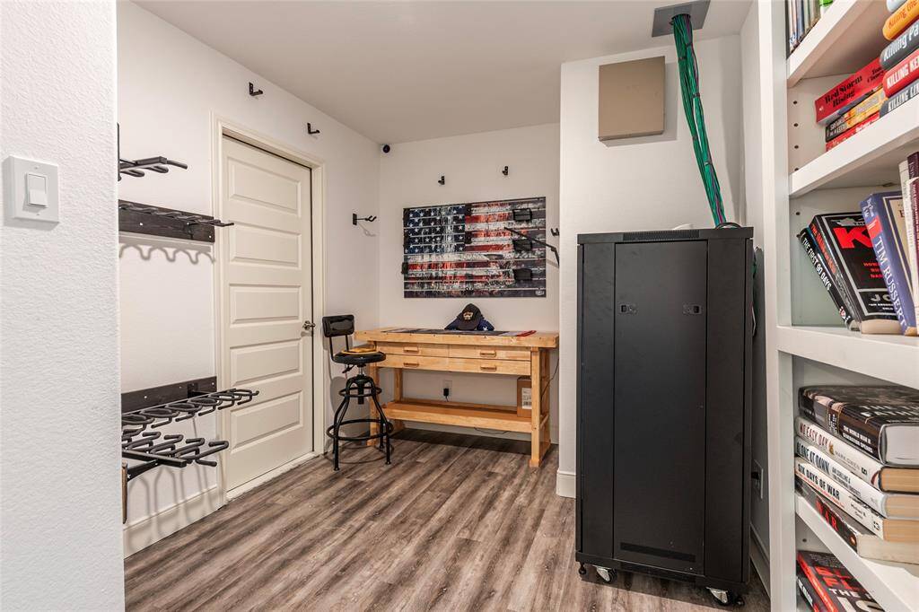 Discover the upstairs concealed “bonus” room—discretely hidden behind a custom built-in bookshelf for an exclusive, private retreat.
