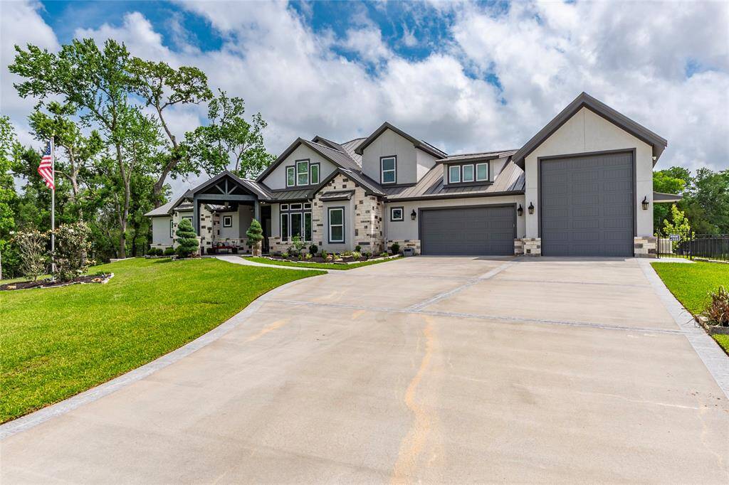 Expansive extended driveway offers ample parking for RVs, boats, multiple vehicles, and more—all with the freedom of no HOA. Energy efficient features include tankless water heater, solar panels and emergency generator operated on propane.
