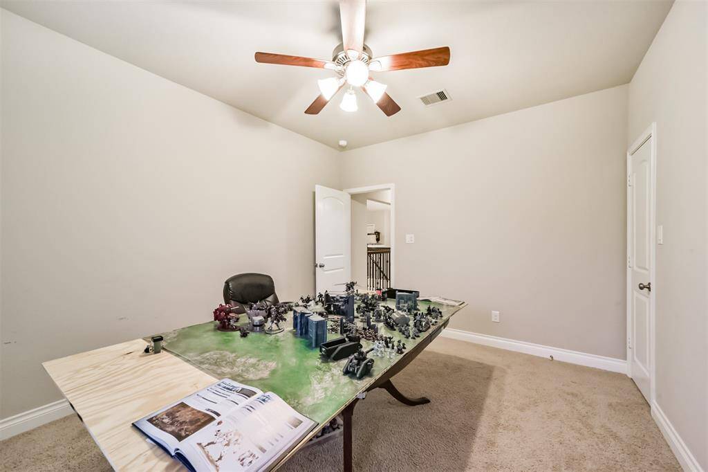 Fourth bedroom that is currently used as play room.