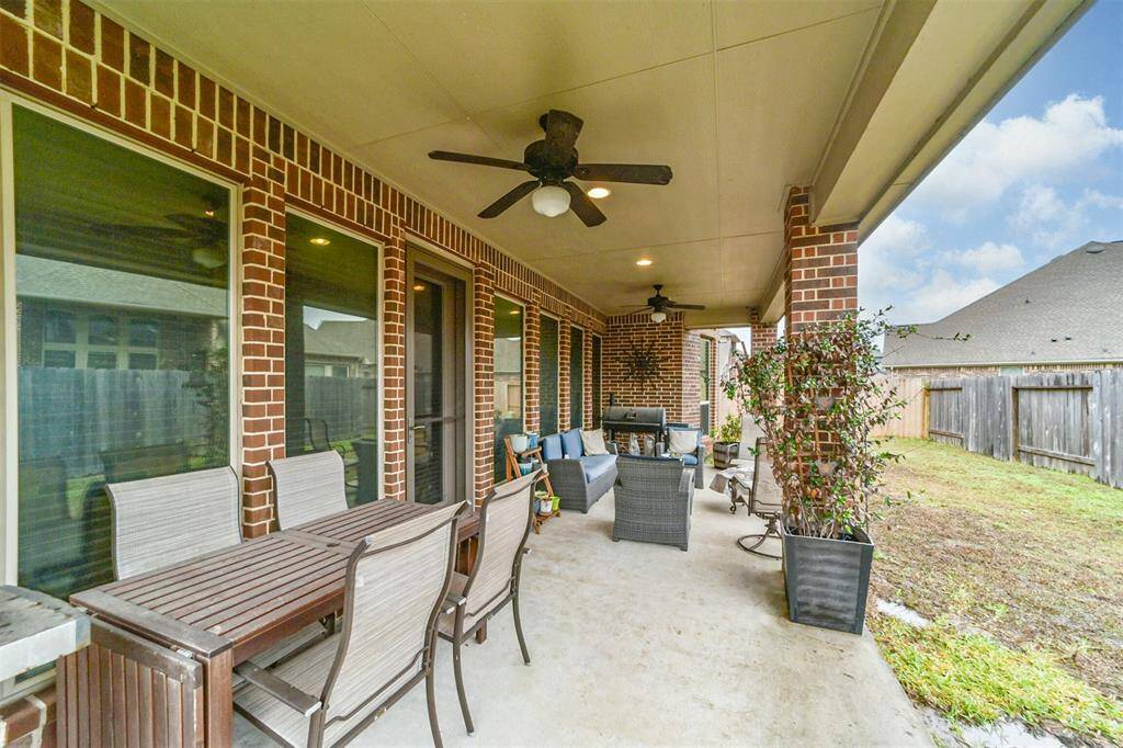 This covered patio provides a great space for entertaining, outdoor grilling and /or simply relaxing and unwinding.