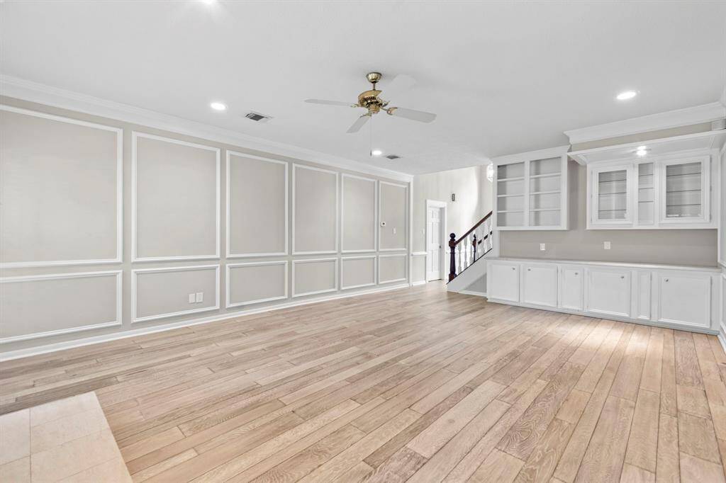 Another view of this living room on the first floor. Notice the custom built ins!