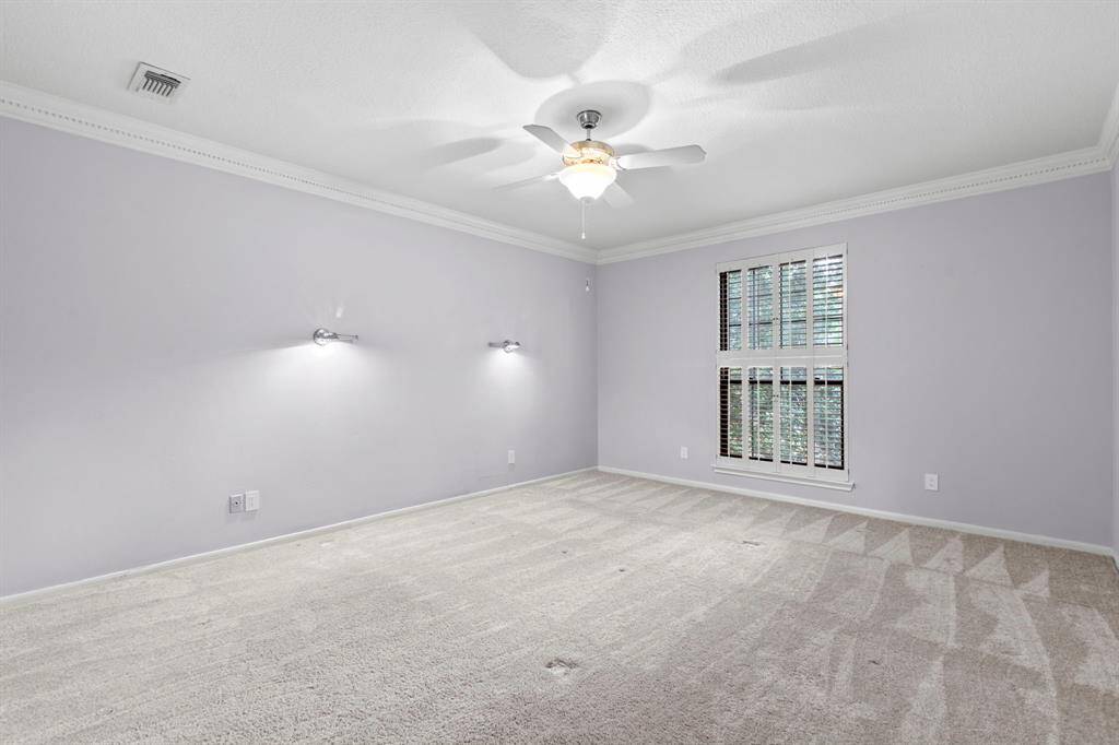 The primary bedroom is on the first floor to the right as you enter the home. Large enough for your bedroom suit with extra space for a sitting area!