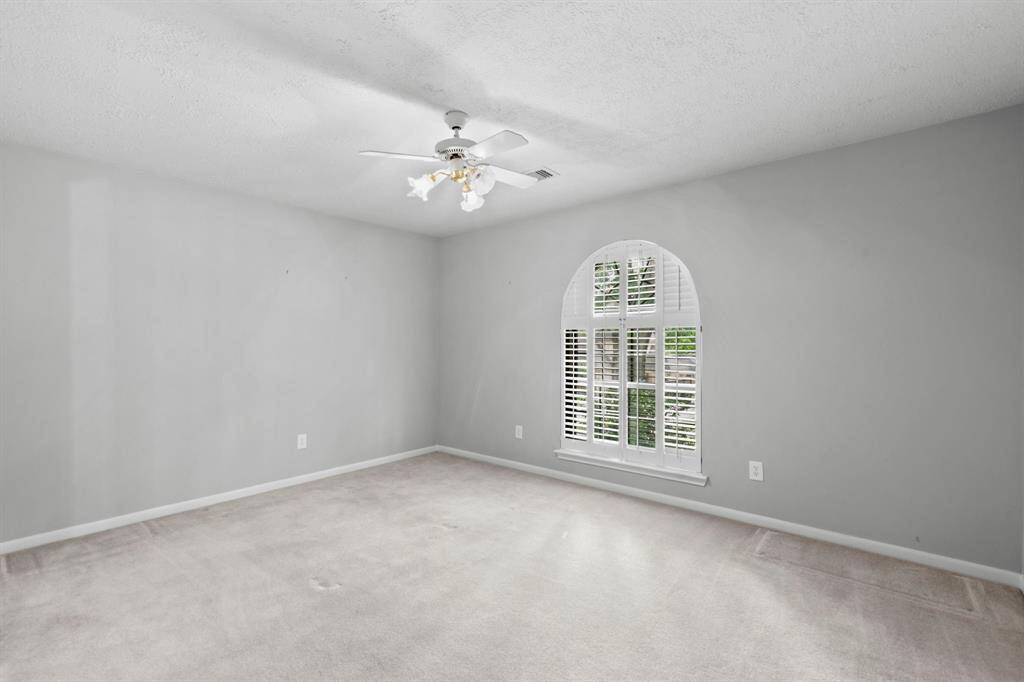 This is bedroom number 4- the third bedroom located upstairs. Great window outlooking to the front of the home.