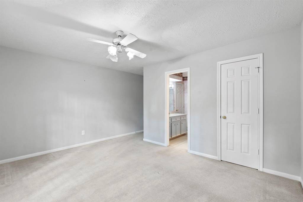 Neutral paint, white trim, ceiling fan, large closet, and private full bath attached!