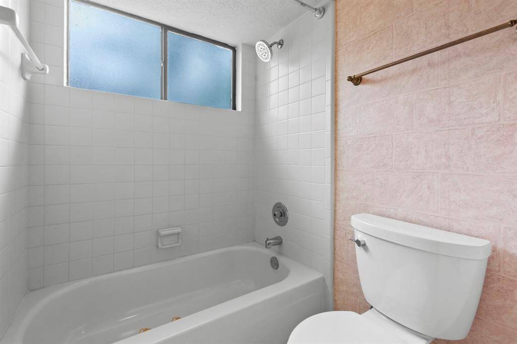 Tub/shower combo in this third full bath.