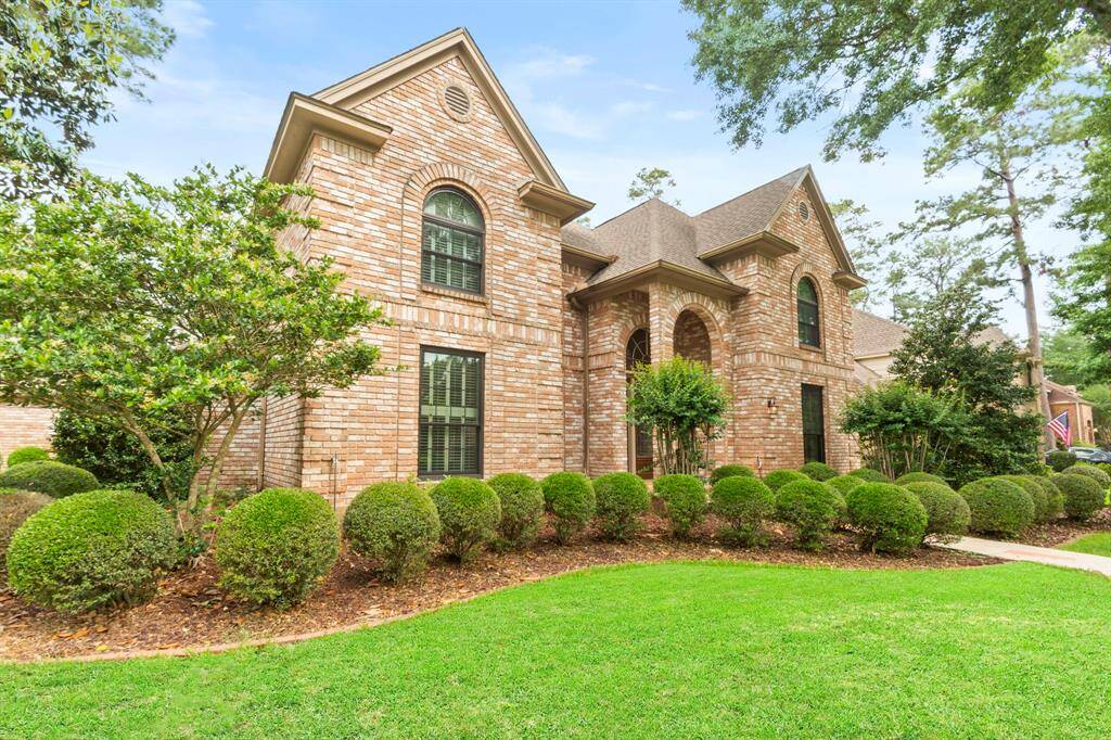 Two story brick with replaced windows- letting all the light and none of the heat in!