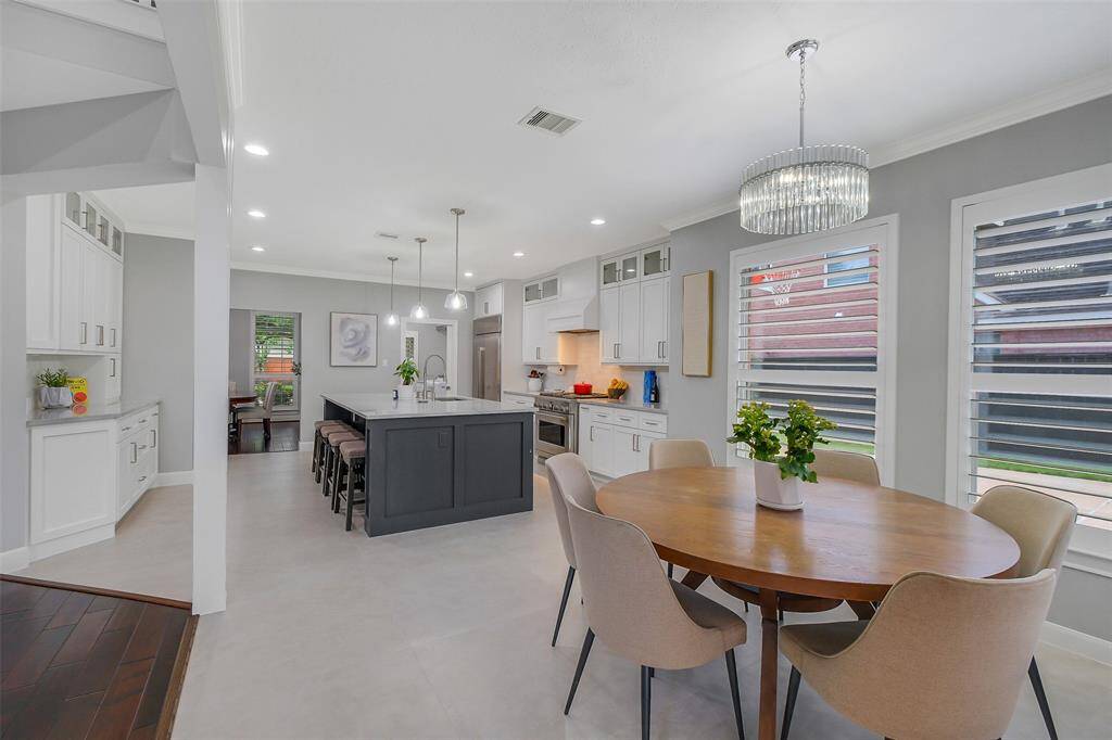A grand yet inviting living space, where layered textures, custom lighting, and designer details create a harmonious blend of comfort and sophistication.