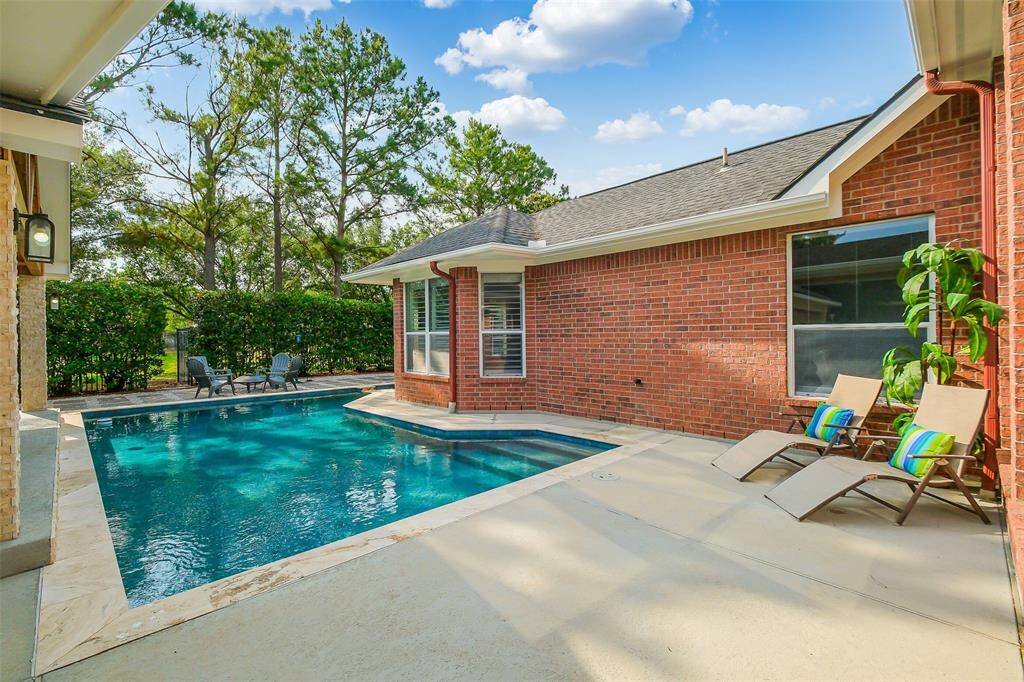 A peaceful haven where time seems to slow, and every detail is designed for serenity. The stillness of the pool's surface reflects the calm beauty of the surrounding landscape, inviting quiet moments of relaxation and reflection.