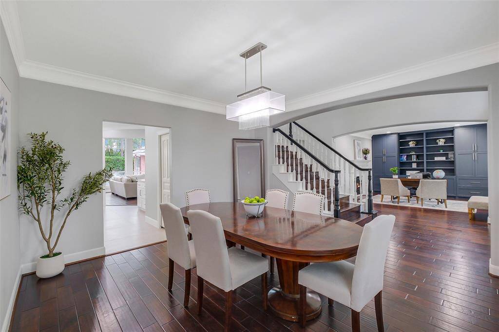 A graceful dining area framed by ambient lighting and timeless architectural details—perfect for hosting with poise and charm.