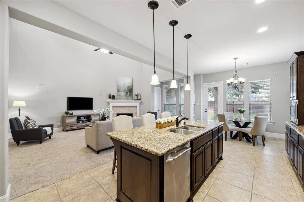 Spacious kitchen with ample prep area for culinary enthusiasts.