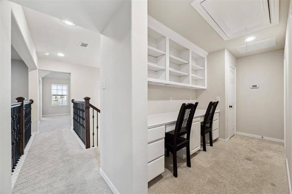 Perfect for students: dual built-in desks with shelving.