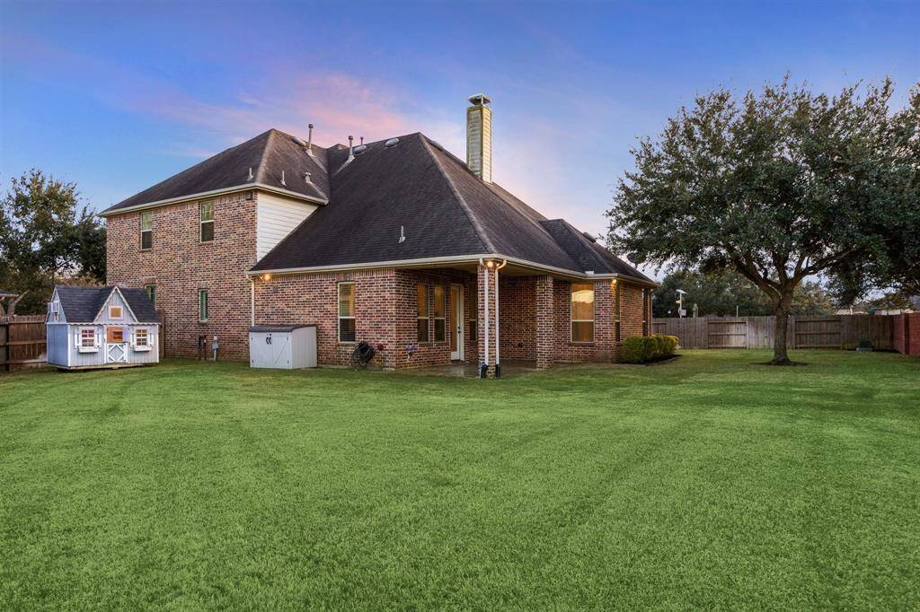 Great back patio perfect for outdoor living and entertaining.