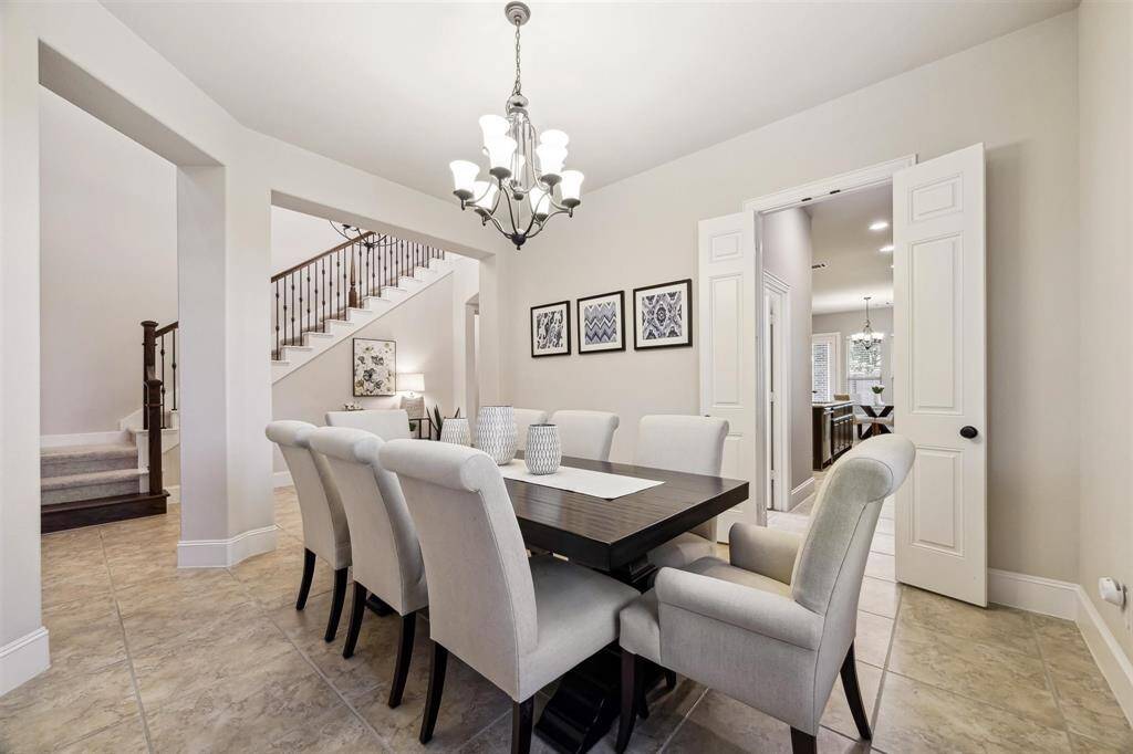 Exquisite dining room with abundant natural light and french doors leading to the butler's pantry. Perfect for entertaining!