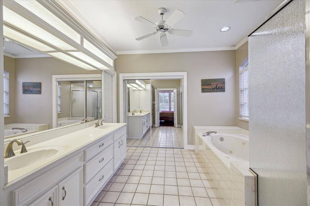 Ensuite bath featuring double sinks