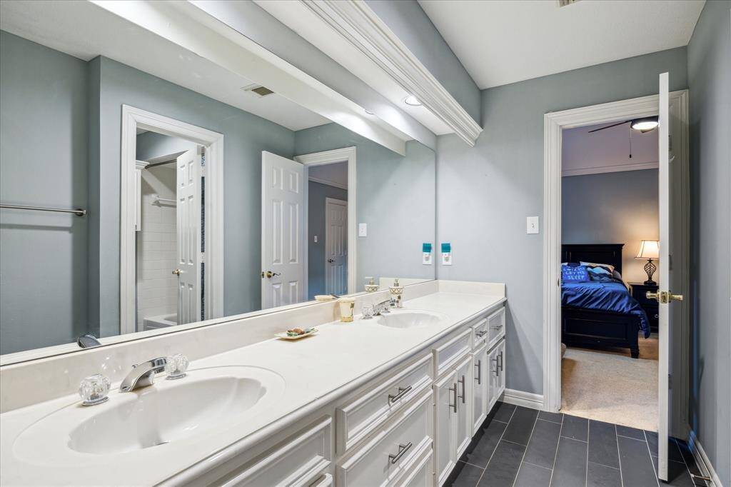 Jack n Jill bath with double sinks with access to Bedrooms 3 & 4