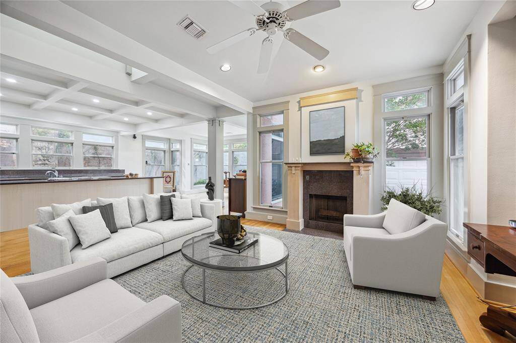 This inviting great room is such a fabulous area to entertain. Imagine serving loved ones at the spacious kitchen island, seamlessly connected to the inviting family room for effortless gatherings. This photo has been virtually staged.