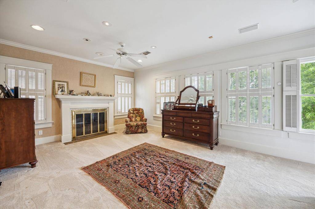 Stay warm during the winters with this 3rd gas log fireplace in the primary bedroom. There is clearly enough room for a separate sitting area.