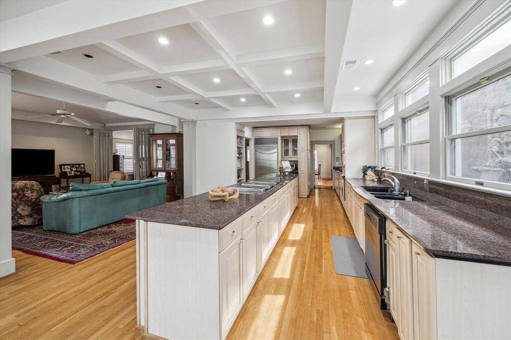 Unlike many 1920's homes, it's open to a family room, so ideal for today's entertaining. The beams in the ceiling are steel.