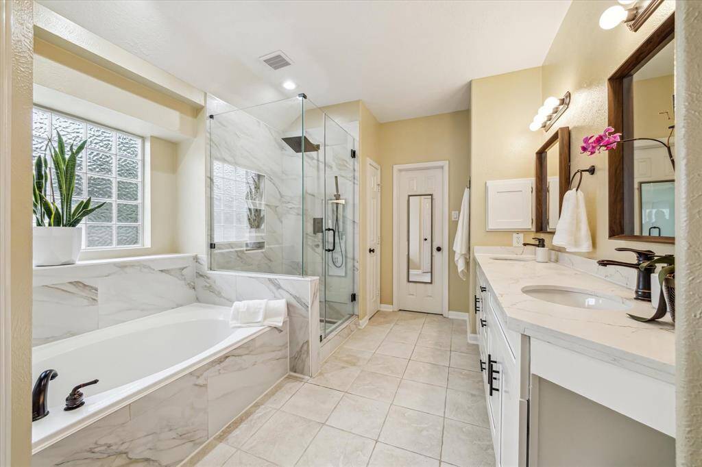 Updated Primary Bedroom with enlarged shower!