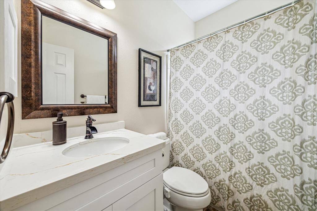 Full downstairs bathroom next to guest suite.
