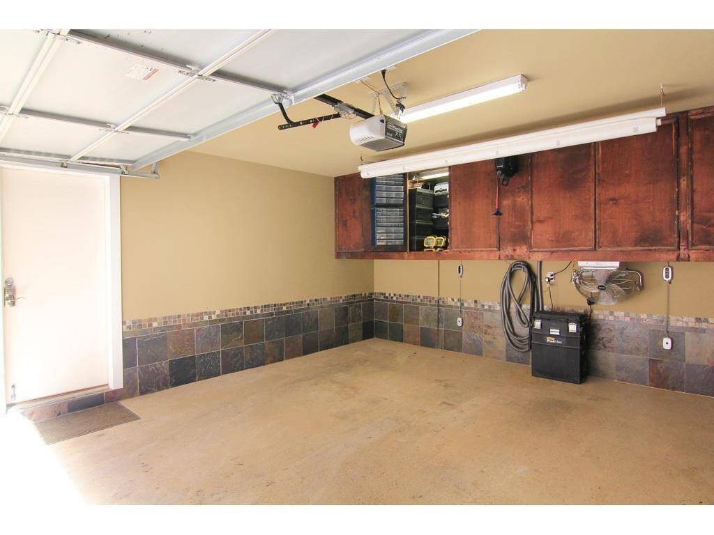 Garage with built-ins and air conditioner