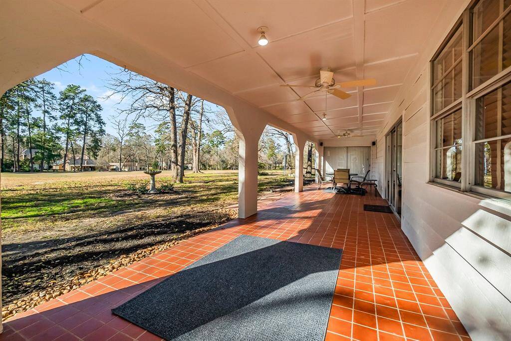 Panoramic views from this large covered back patio. Perfect blend of comfort and natural beauty.