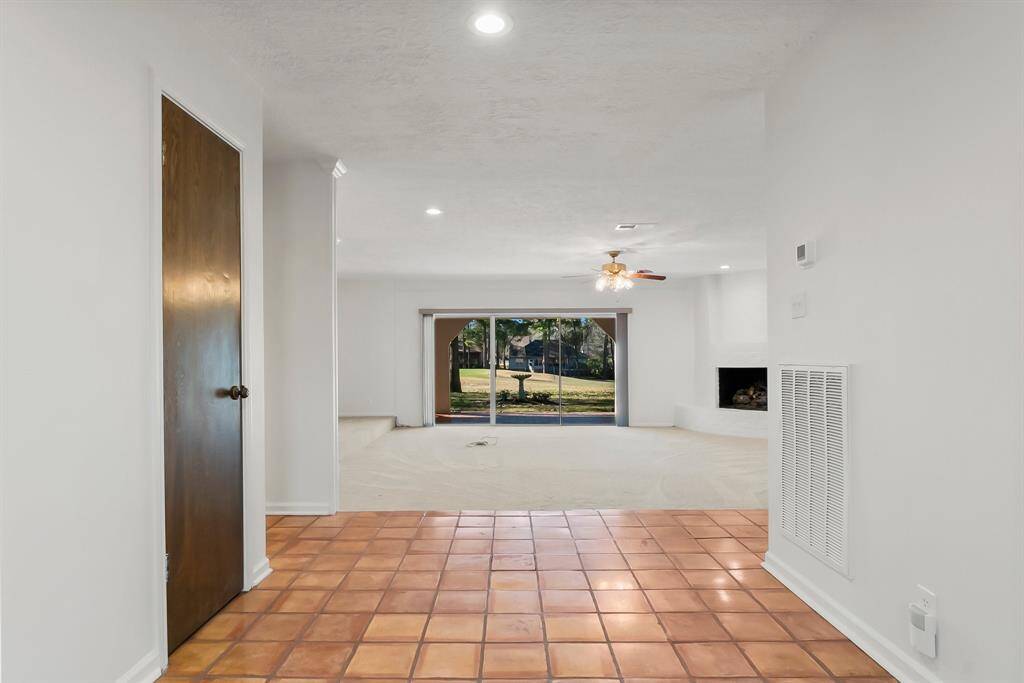 Wall of windows across the back makes for abundant sunlight and picturesque views.