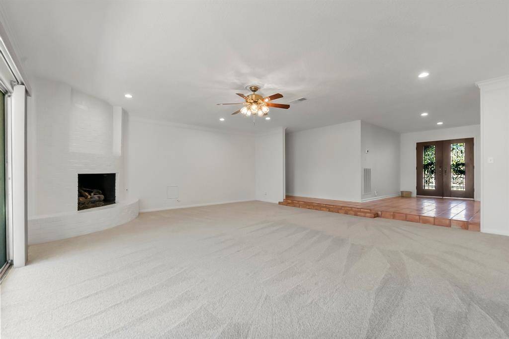 Fresh carpeting.  Interior paint recently completed to include ceilings. All new recessed lighting.