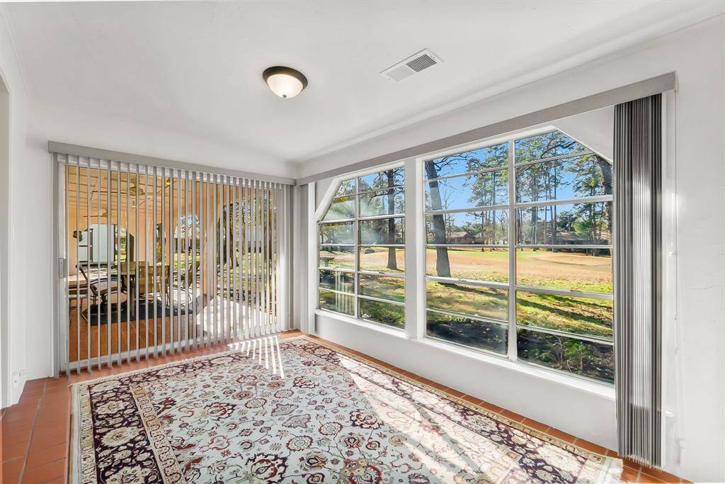 Flex room off of the primary bedroom.  Could be sunroom, office, nursery, workout room.