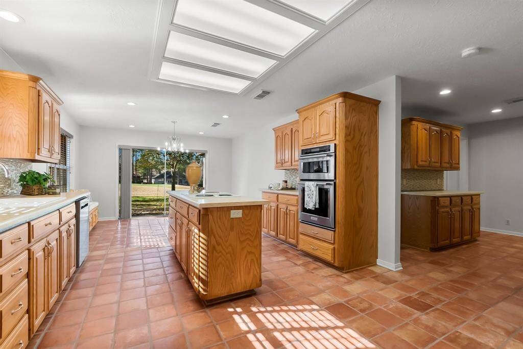 Perfect for everyday living and entertaining. Breakfast room filled with natural light. Butler's pantry adds prep space ideal for entertaining. Thoughtful design has seamless flow between kitchen, breakfast room and dining area.