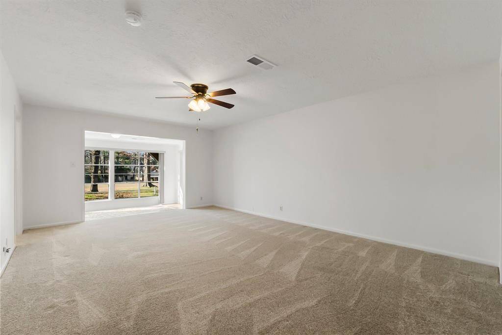 Large primary w/ flex room attached.  Previous owner used this area as a TV room and the flex room was an office.