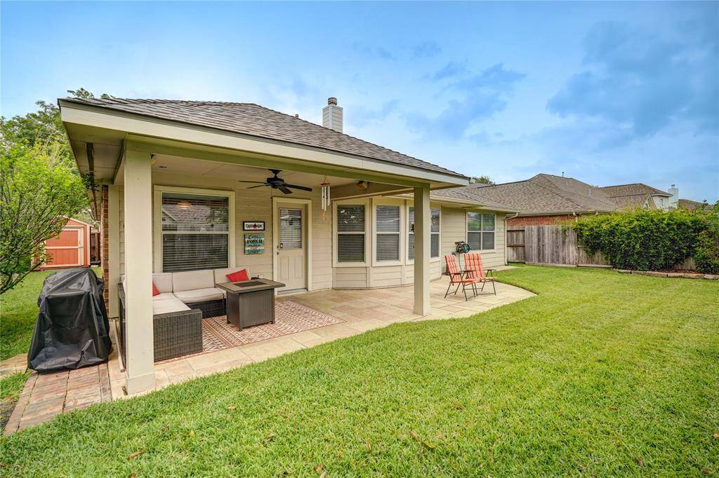 Scrumptious!  A chillin' and separate grillin' area! Sun or shade, that is the decision of the day! So much room for potted plants, a storage shed, room to play with Spot and the family...