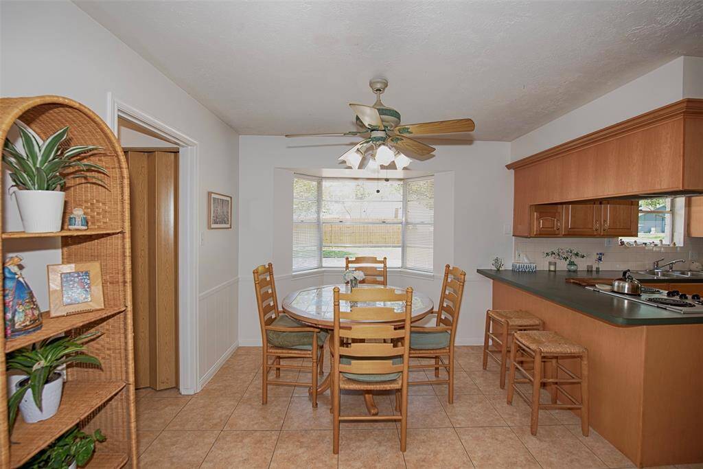 A very spacious breakfast area, recently painted, features a large bay window which offers tons of natural lighting.